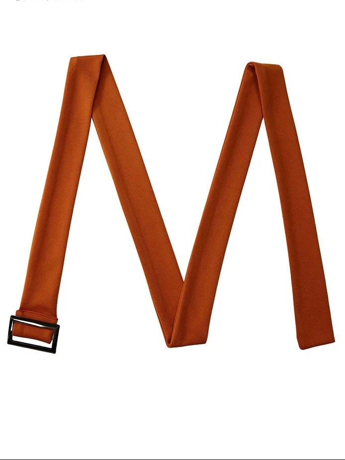 A wide, flat brown belt with a black metal buckle, arranged in an M-shape on a plain white background. The brand name 'Mlaiscr' is printed in black in the top left corner.