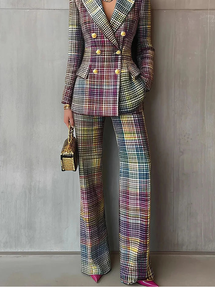 Person wearing a plaid suit with a neutral background
